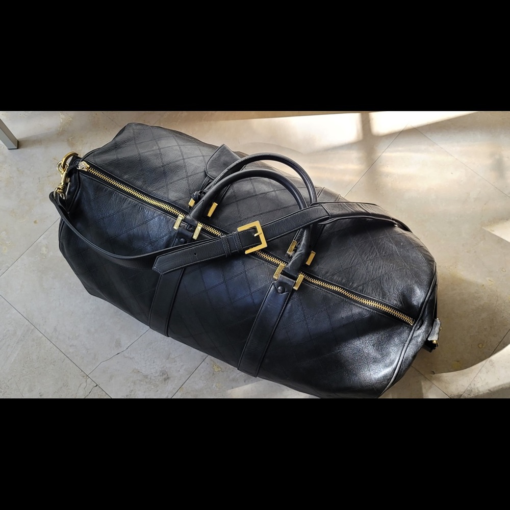 CHANEL Black Quilted Leather Travel Duffle with Gold Hardware